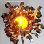 Portavelas decorativo con latas de refrescos recicladas